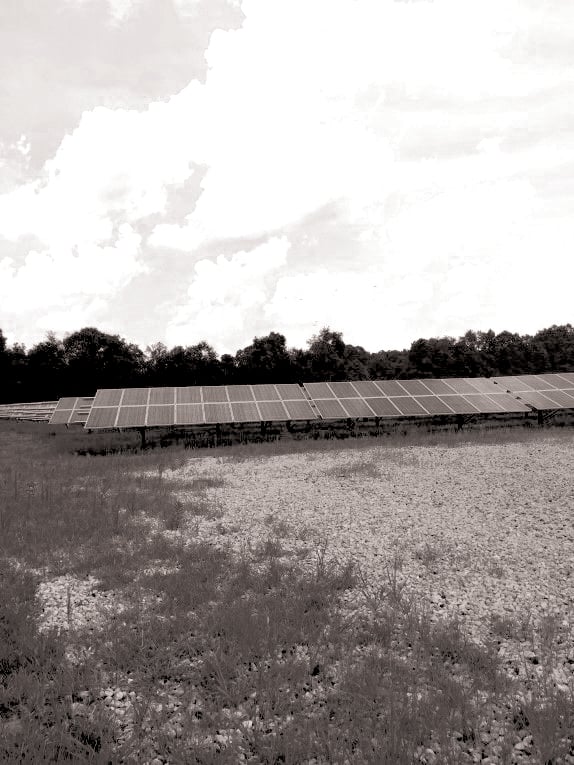 Figure 3 - Typical solar panel array in an open field-cmyk-0Sat